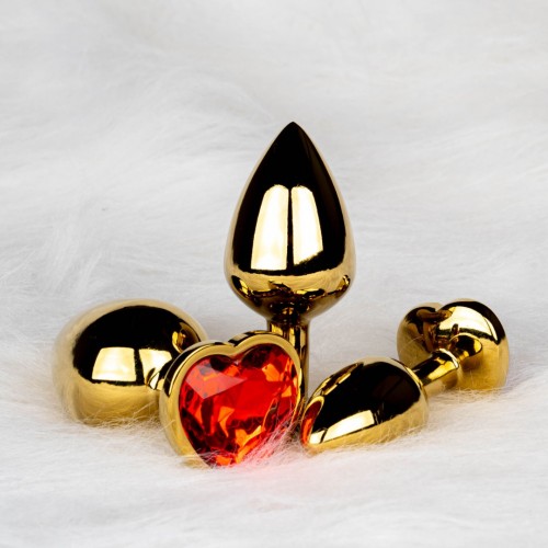 Μεταλλική Πρωκτική Σφήνα Με Κόσμημα Καρδιά - Shots Heart Gem Butt Plug Gold/Red Large